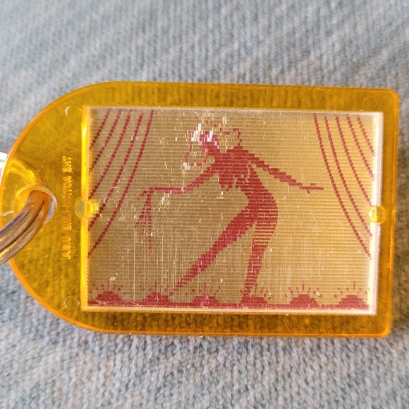 Picture Changing Keychain - Lady Changing Clothes Jewelry Store Ho Phone Cary NC - Picture 9 of 12